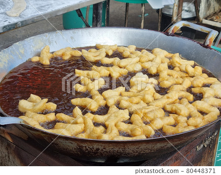 Patongo fried food breakfast fry in a pan Patongo fried food breakfast fry in a pan 80448371