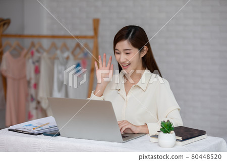 Asian young woman online meeting VDO conference with business team or family,young girl live streaming in social media online platform,Lifestyle at home concept Asian young woman online meeting VDO conference with business team or family,young girl live streaming in social media online platform,Lifestyle at home concept 80448520