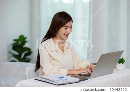 Entrepreneur of beautiful business asian young woman working online with laptop at home,Freelance woman working online sale marketing at home,Small Business Startup concept Entrepreneur of beautiful business asian young woman working online with laptop at home,Freelance woman working online sale marketing at home,Small Business Startup concept 80448522
