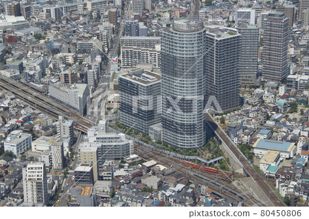 View from Tokyo Skytree: Tobu Kameido Line 8000 series red train departing Hikifune Station 80450806