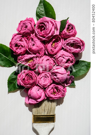 Paint brush drawing with pink flowers on white background. The concept of spring and international womens mothers day. Floral painting and decoration creative 80452400