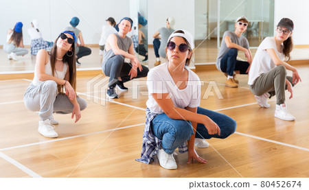 Happy girls and boy dancing hip hop 80452674