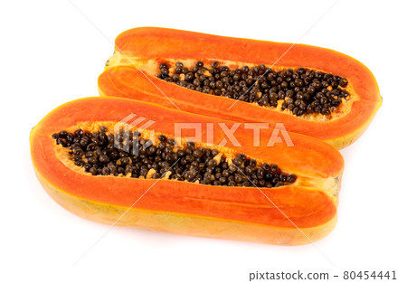half of ripe papaya fruit with seeds isolated on white background half of ripe papaya fruit with seeds isolated on white background 80454441