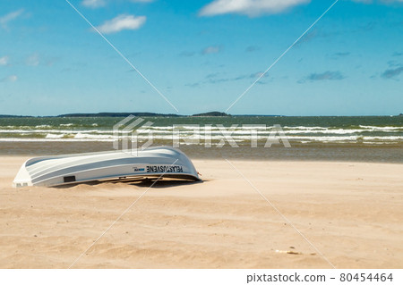 Pori, Finland - 27 June, 2019: Lifeboat on beautiful sandy beach Yyteri at summer, in Pori, Finland 80454464