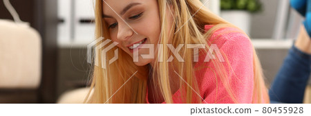 young beautiful blond woman lie on the floor read book young beautiful blond woman lie on the floor read book 80455928