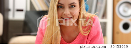 young beautiful blond woman lie on the floor read book young beautiful blond woman lie on the floor read book 80455929