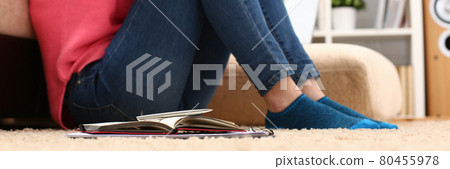 Unhappy lonely depressed woman sitting on the couch Unhappy lonely depressed woman sitting on the couch 80455978