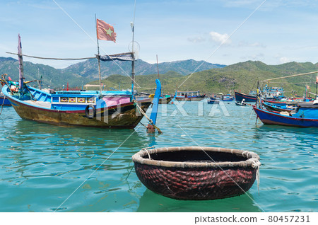 fishing boats, junks in the sea bay near the island of Vinperl fishing boats, junks in the sea bay near the island of Vinperl 80457231