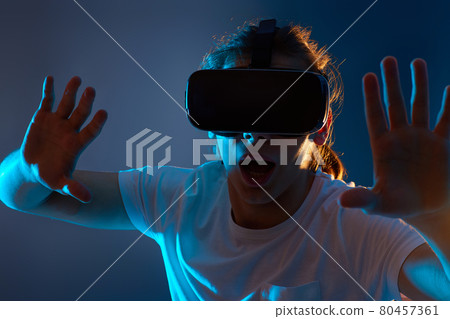 Young man using virtual reality headset. VR gadgets Young man using virtual reality headset. VR gadgets 80457361