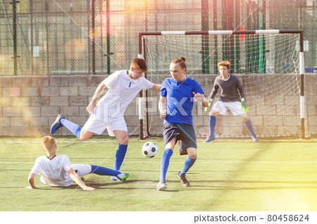 Young football players fighting for ball 80458624