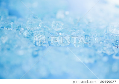Selective focus,blurred photo of broken pieces of glass on blue background. Abstract minimalistic concept. Space for text . Selective focus,blurred photo of broken pieces of glass on blue background. Abstract minimalistic concept. Space for text . 80459027
