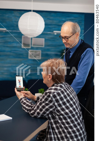 Senior sick man and woman talking with doctor Senior sick man and woman talking with doctor 80463540