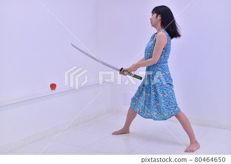 Woman playing with imitation sword 6 Woman playing with imitation sword 6 80464650