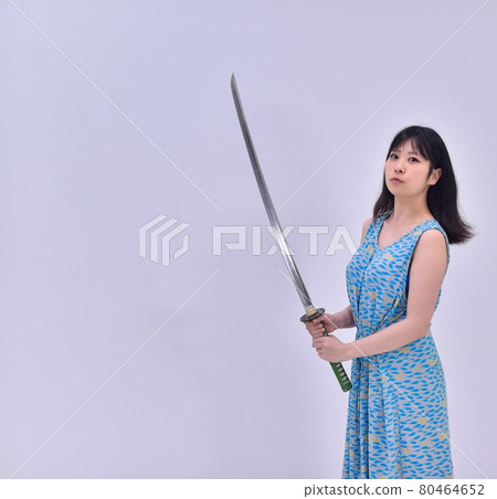 Woman playing with imitation sword 4 Woman playing with imitation sword 4 80464652