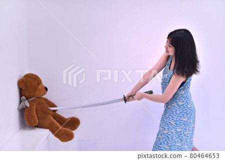 Woman playing with imitation sword 3 Woman playing with imitation sword 3 80464653
