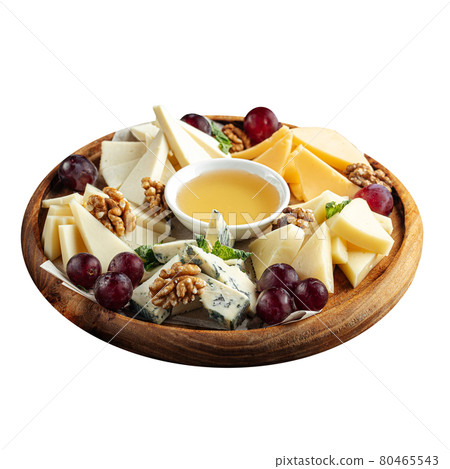 Cheese appetizer platter with grapes and honey 80465543