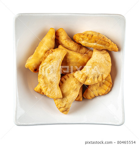 Isolated plate of fried cheburek meat stuffed pies 80465554