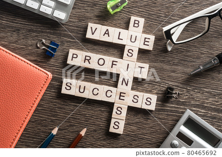Conceptual business keywords on table with elements of game making crossword Conceptual business keywords on table with elements of game making crossword 80465692