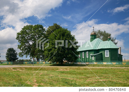 Old vintage wooden church of the Great Martyr George the Victorious in Ostrovki, Nesvizh district, Minsk region, Belarus. 80470848