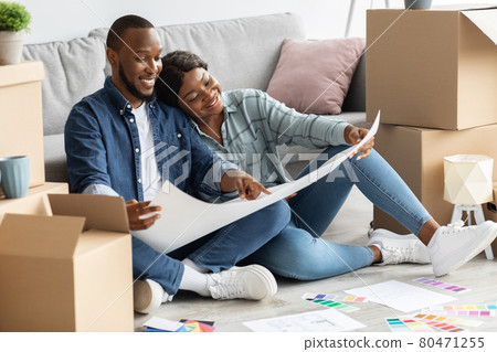 Black Spouses Planning Home Renovation, Checking Blueprints And Color Palette Black Spouses Planning Home Renovation, Checking Blueprints And Color Palette 80471255