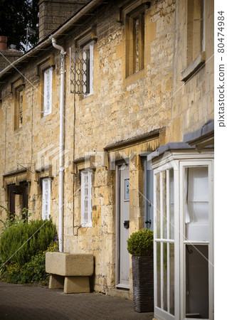 English terraced street in market town in the Cotswolds English terraced street in market town in the Cotswolds 80474984