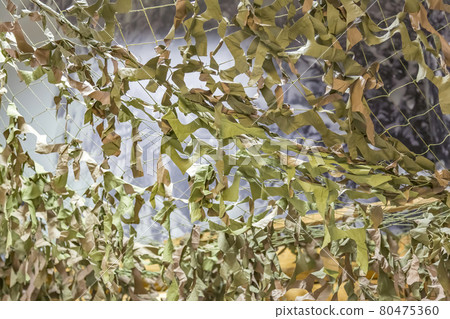 Synthetic camouflage net for hiding military objects and equipment Synthetic camouflage net for hiding military objects and equipment 80475360