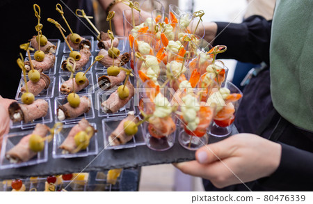 buffet table - a lot of canapes and sandwiches, shallow DOF. buffet table - a lot of canapes and sandwiches, shallow DOF. 80476339