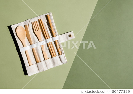 Set of Eco friendly bamboo cutlery on green background. Sustainable lifestyle. Plastic free concept. Zero waste concept. Place for text 80477339
