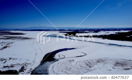 Abashiri's winter lake and Mt. Shari Abashiri's winter lake and Mt. Shari 80477637