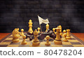 Dark chess raises a white flag in surrender to bright chess on a chessboard and smoke floating in the air and dark brick background. The concept of business loss and bankruptcy. 80478204