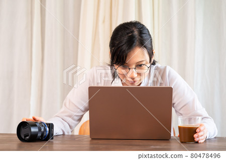 Woman doing creative work 80478496