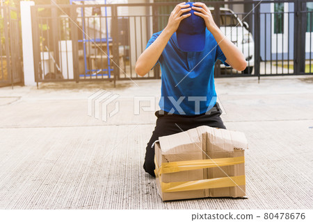 Delivery man he emotional courier hold damaged cardboard box is broken Delivery man he emotional courier hold damaged cardboard box is broken 80478676