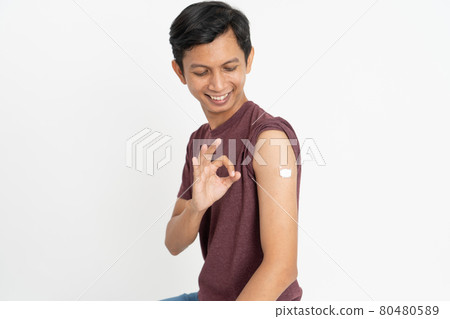 Asian Patient Getting Vaccinated Against Coronavirus by doctor Asian Patient Getting Vaccinated Against Coronavirus by doctor 80480589