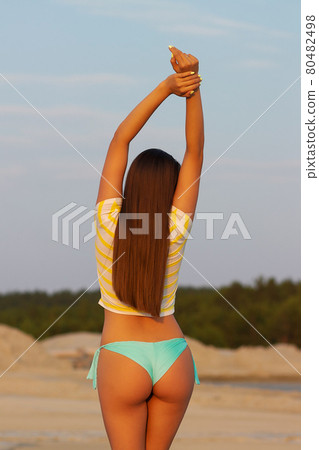 Alluring buttocks of woman in bikini 80482498