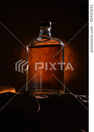 Whiskey bottle in the dark 80483691