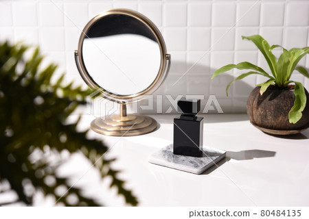 Bathroom view with perfume bottle Bathroom view with perfume bottle 80484135