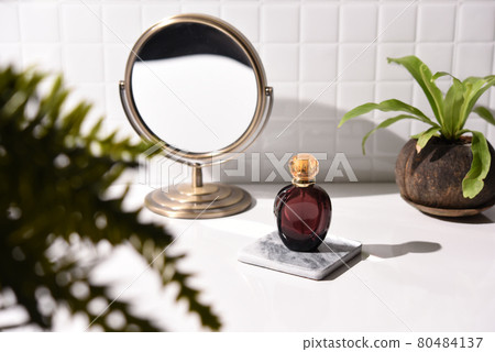 Bathroom view with perfume bottle 80484137