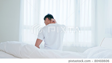 man has neck pain 80488606