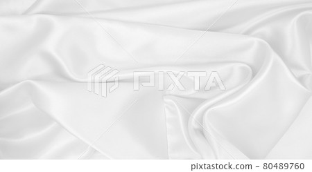 Smooth elegant white silk or satin luxury cloth texture as wedding background. Luxurious background design Smooth elegant white silk or satin luxury cloth texture as wedding background. Luxurious background design 80489760