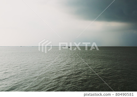 Small hut in the middle of the sea under coming storm. 80490581