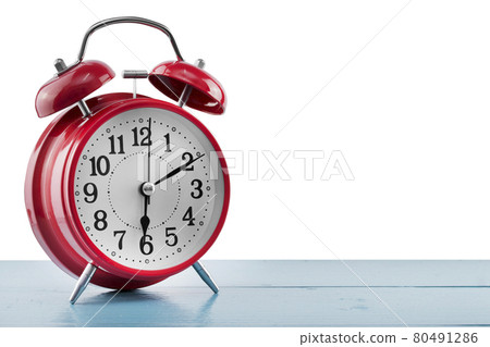 alarm clock on the table on white background. 80491286