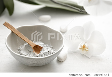 Spa composition with powder face mask and orchid flower. 80491851