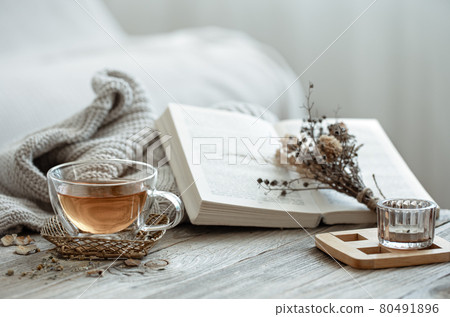 Home still life with a cup of tea and a book. Home still life with a cup of tea and a book. 80491896