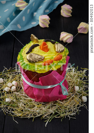Easter cake with yellow whipped egg whites in shape of chicken Easter cake with yellow whipped egg whites in shape of chicken 80492013