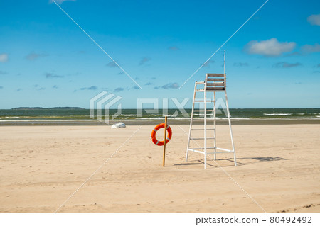 Lifeguard tower and lifering on beautiful sandy beach Yyteri at summer, in Pori, Finland Lifeguard tower and lifering on beautiful sandy beach Yyteri at summer, in Pori, Finland 80492492