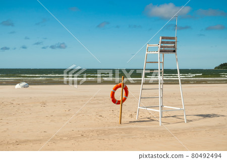 Lifeguard tower and lifering on beautiful sandy beach Yyteri at summer, in Pori, Finland Lifeguard tower and lifering on beautiful sandy beach Yyteri at summer, in Pori, Finland 80492494