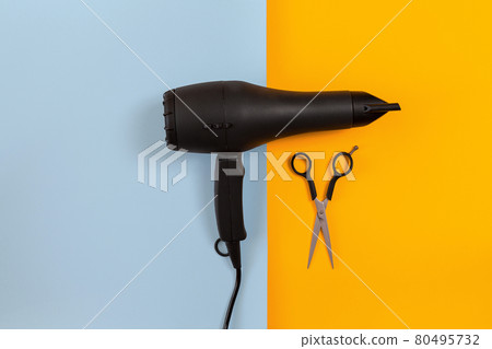 Hairdresser set with various accessories on orange and blue background Hairdresser set with various accessories on orange and blue background 80495732