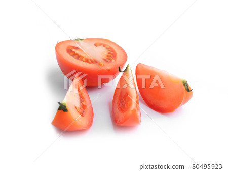 Tomato slices isolated on white background. Fresh vegetable. Raw organic healthy food. Grocery and supermarket cooking and eating. 80495923