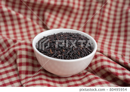 Paddy rice with black riceberry rice isolated on white background. Organic. Raw, wheat or grain. Agriculture. Food. 80495954