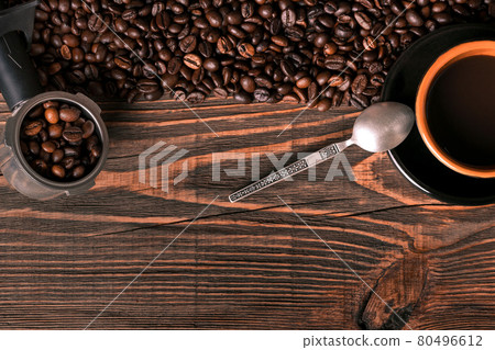 Coffee cup and coffee beans on wooden background. Top view. 80496612